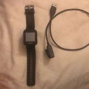 Garmin watch and charger.